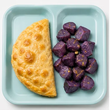 An orbit egg pocket with purple static potatoes on an Eyeview cafeteria tray.